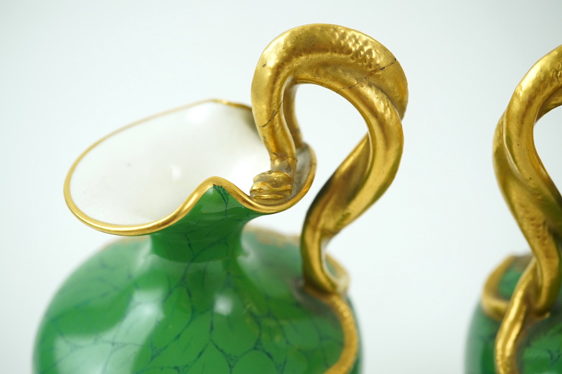 A pair of Royal Worcester fruit painted ewers, by R. Sebright, c.1903